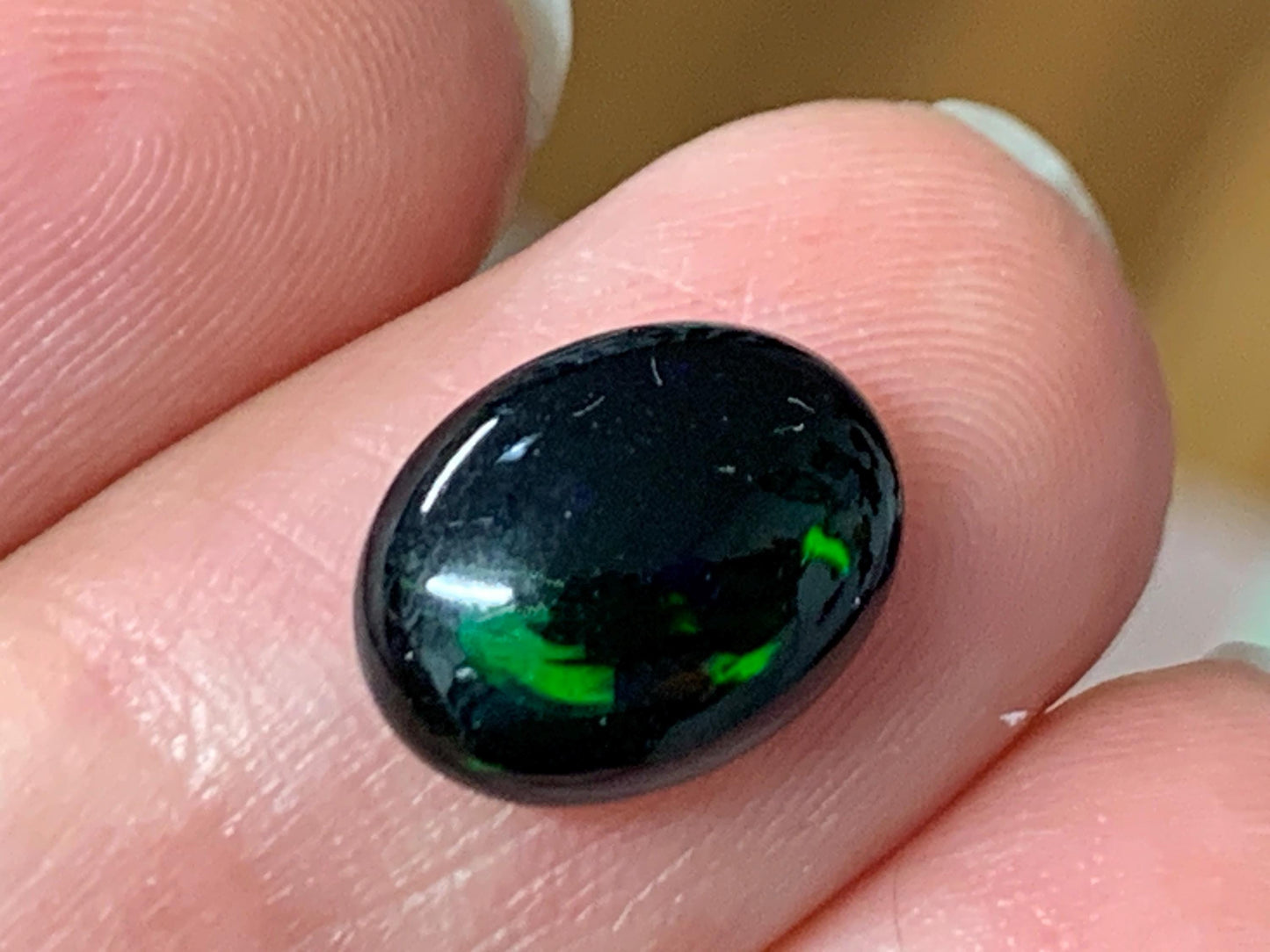 Natural Ethiopian Black Opal 8x11x3.5mm cabochon