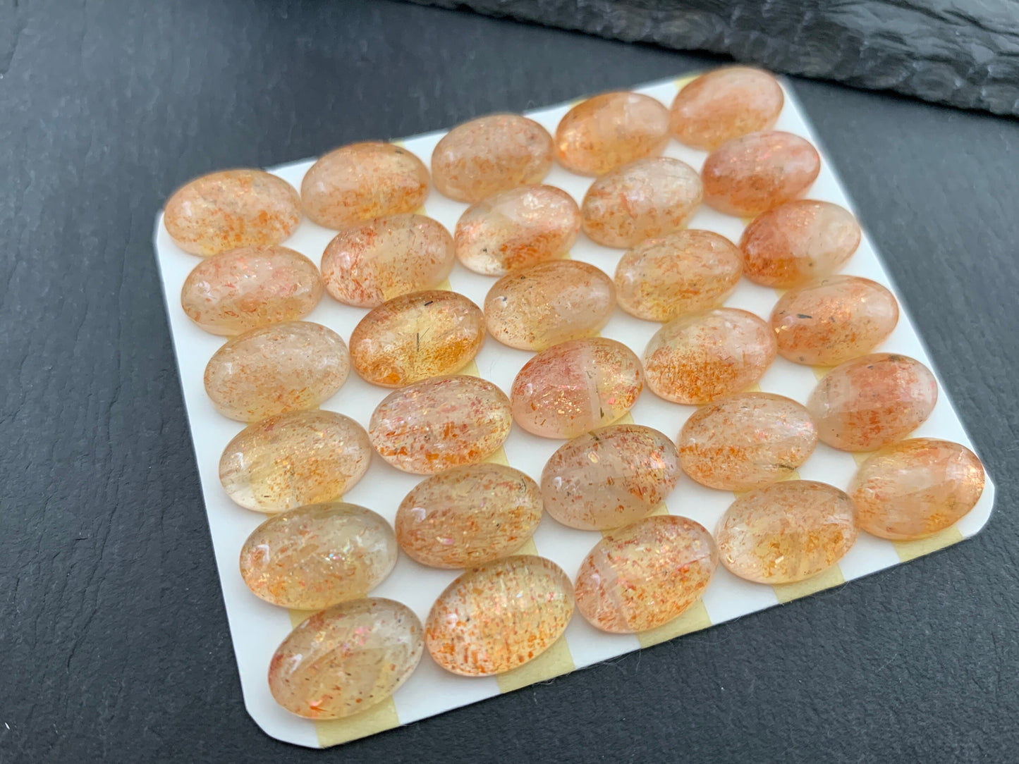 Sunstone Oval 8x12mm cabochon - Calibrated Cabochons