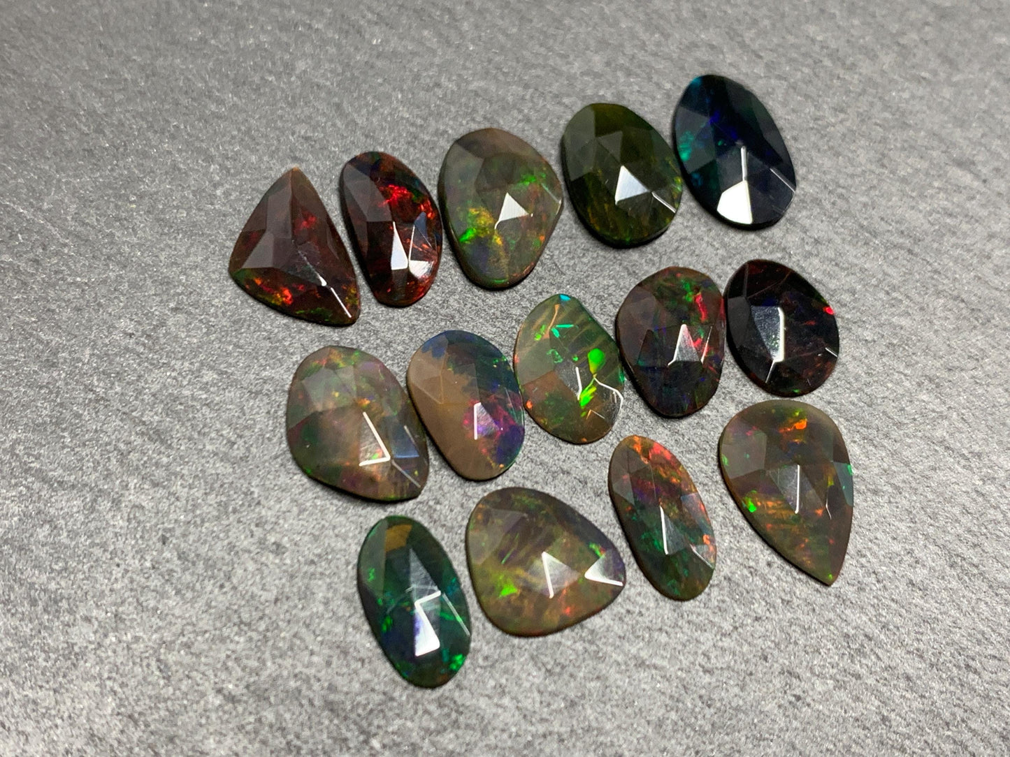 Faceted Black Ethiopian Opal 9-12mm long cabochon
