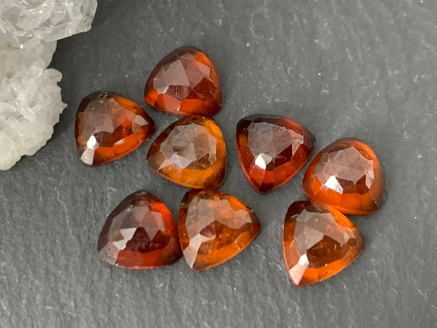 Faceted Hessonite Garnet trillion 6mm cabochon