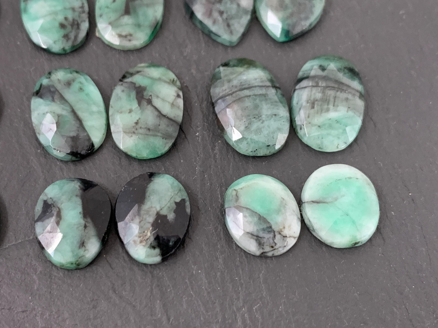 Faceted Emerald pair 14-18mm long cabochon