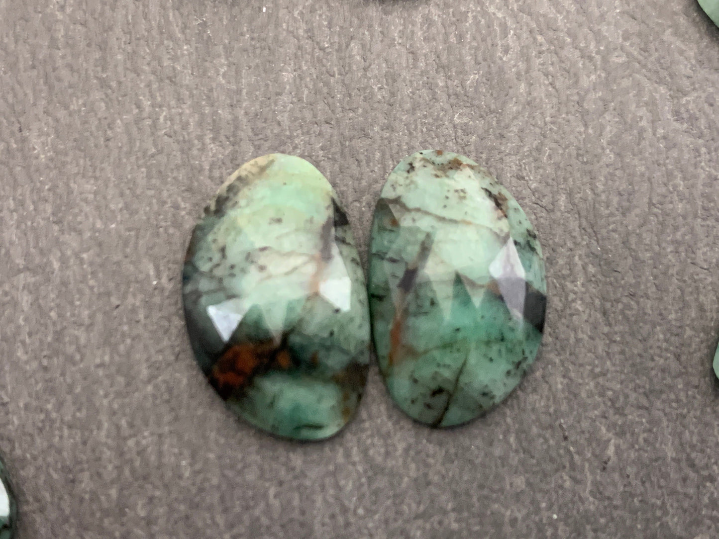 Faceted Emerald pair 13-18mm long cabochon