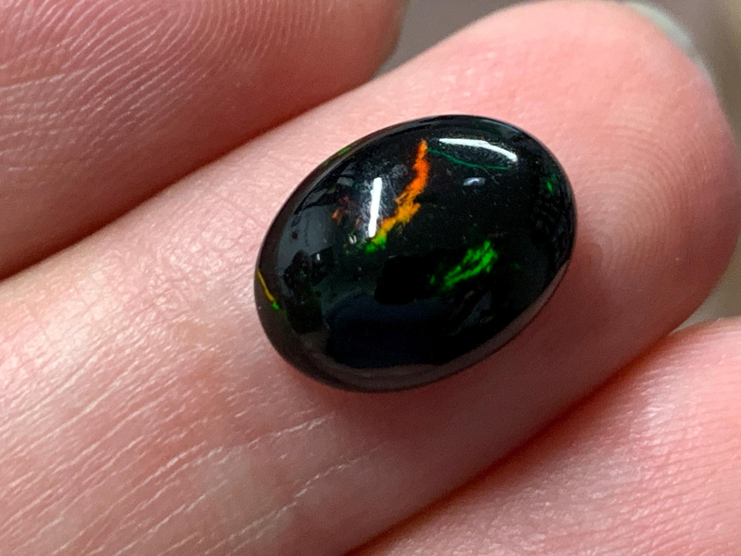 Natural Ethiopian Black Opal 9x12x4mm cabochon