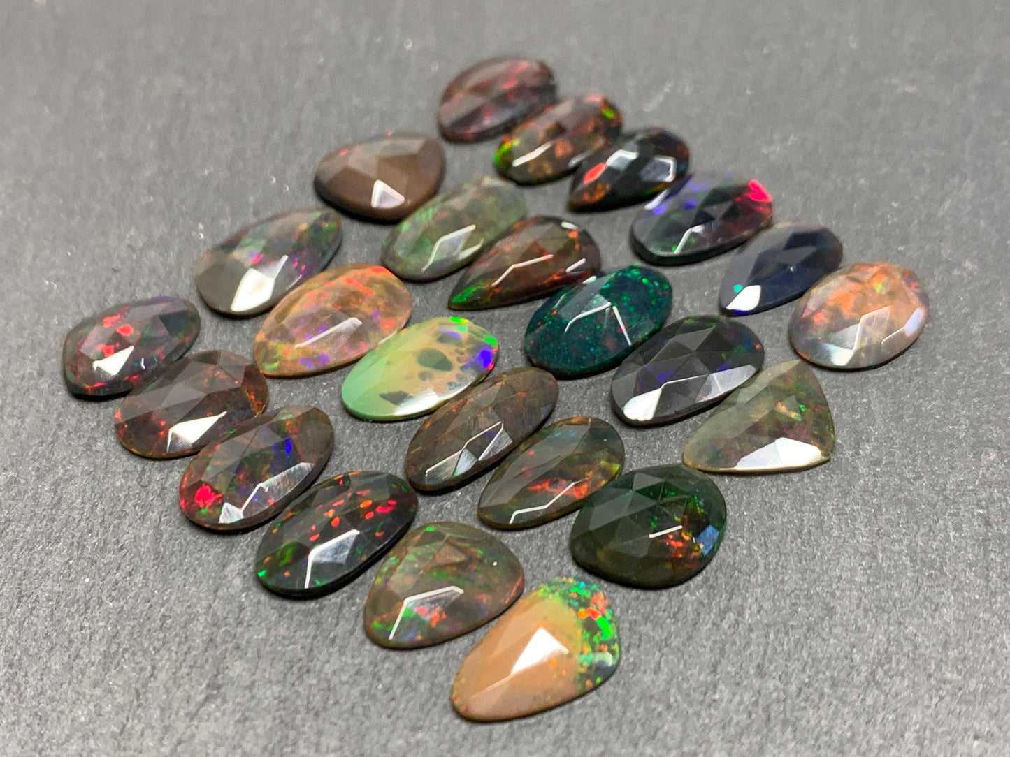 Faceted Black Opal 11-14mm long free form cabochon