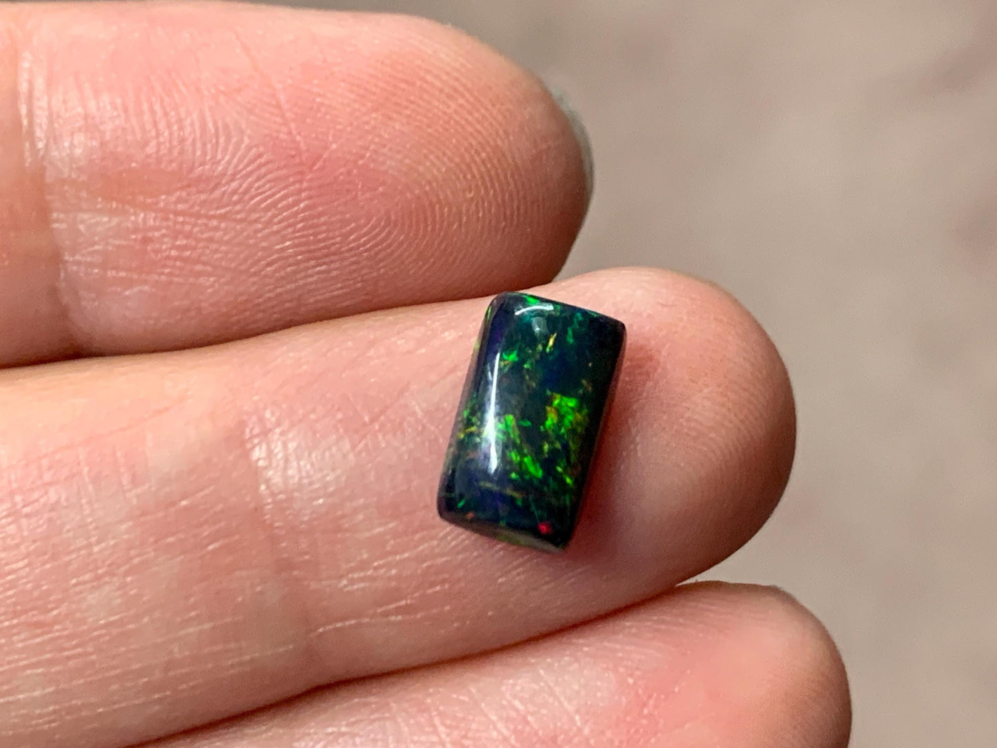 Black Ethiopian Opal rectangle 6x10x3mm cabochon
