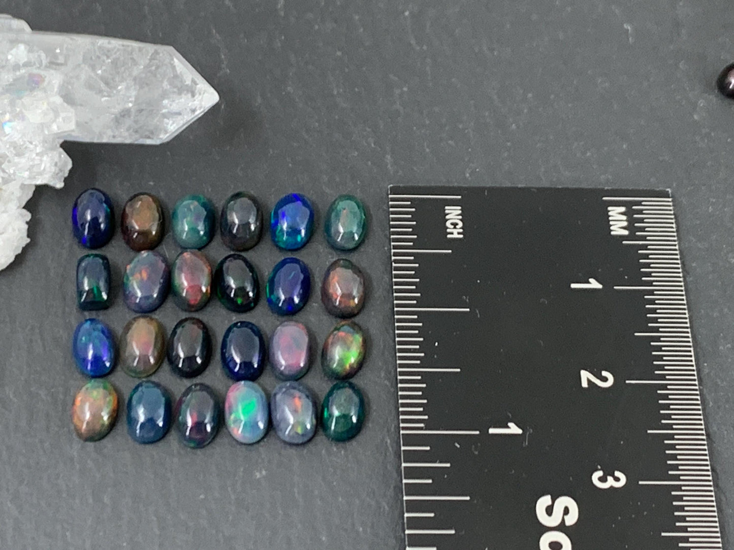 Black Ethiopian Opal oval 4x6mm cabochon