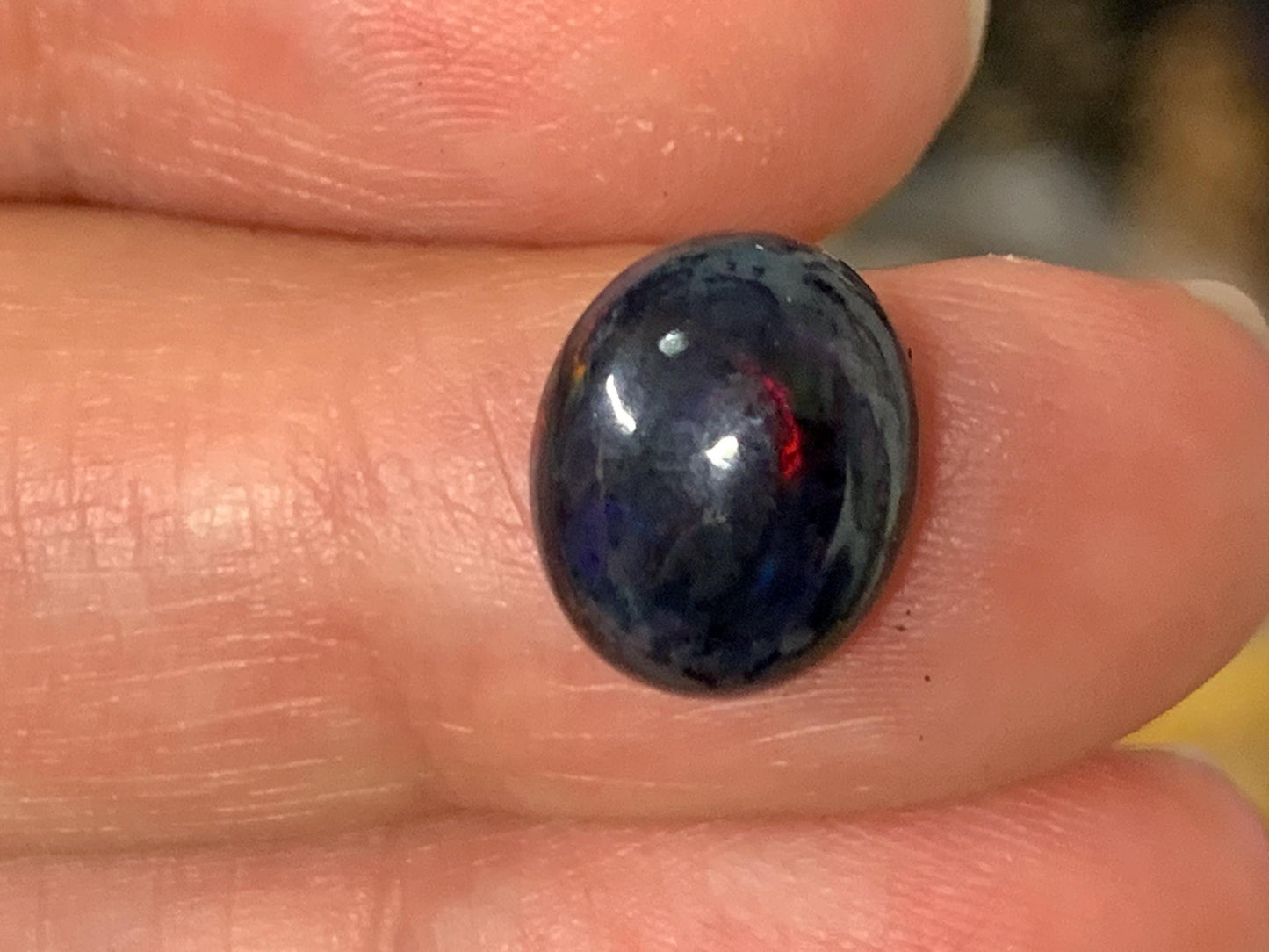 Black Ethiopian Opal 9x11x5mm cabochon