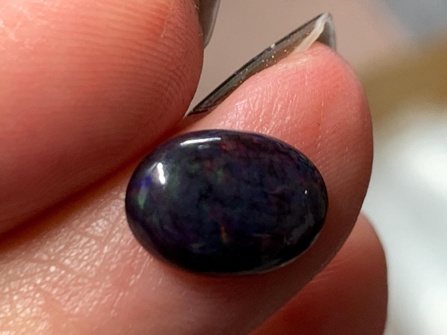 Natural Ethiopian Black Opal 9x11x5mm cabochon