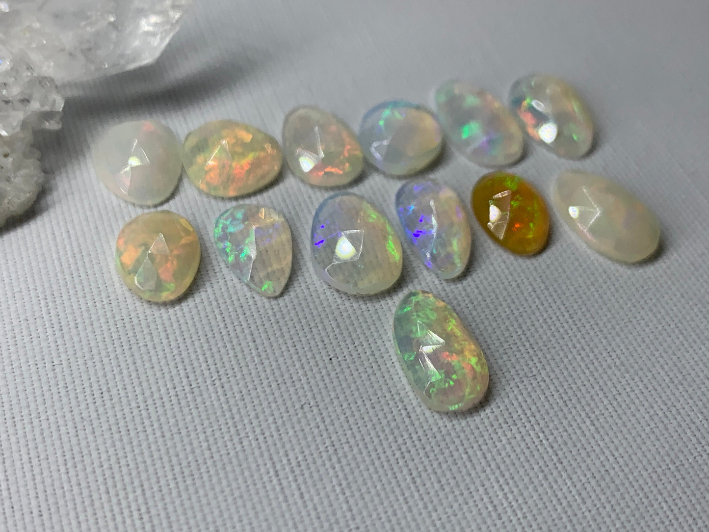Faceted Ethiopian Opal 10-12mm long cabochon