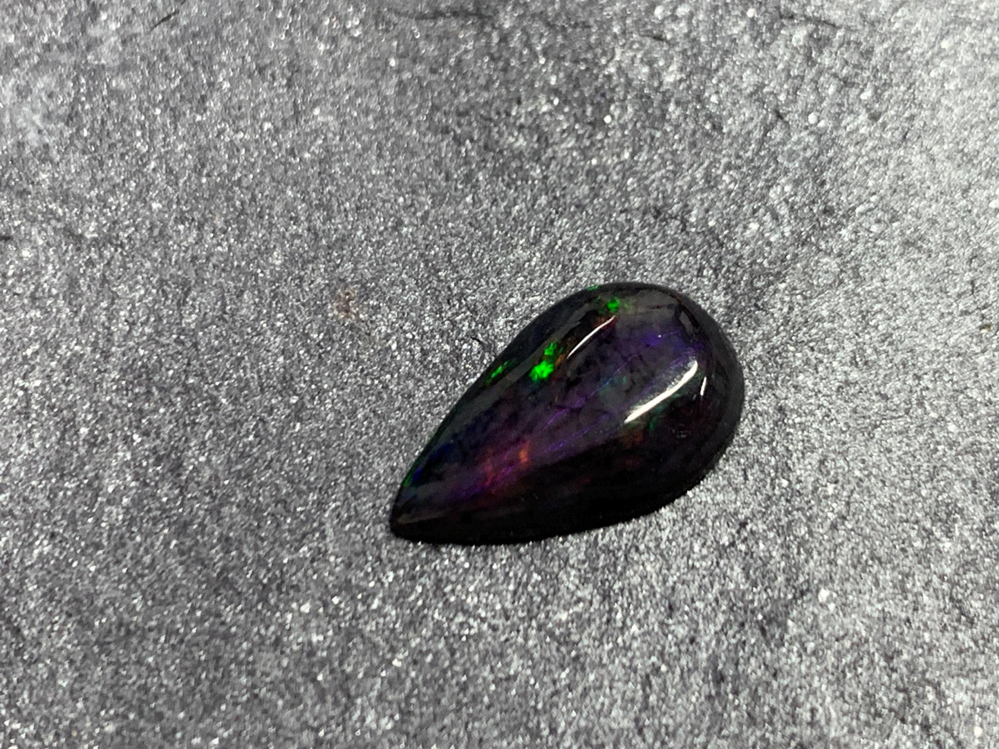 Black Ethiopian Opal pear 9x14x3mm cabochon