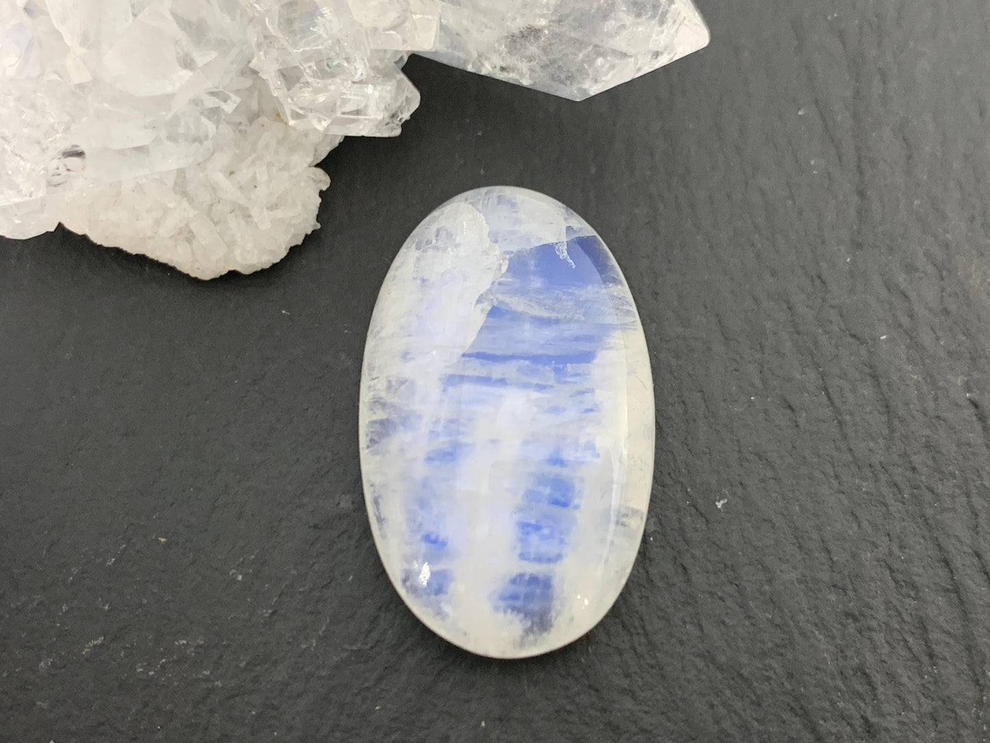 Rainbow Moonstone 24x15x7mm cabochon