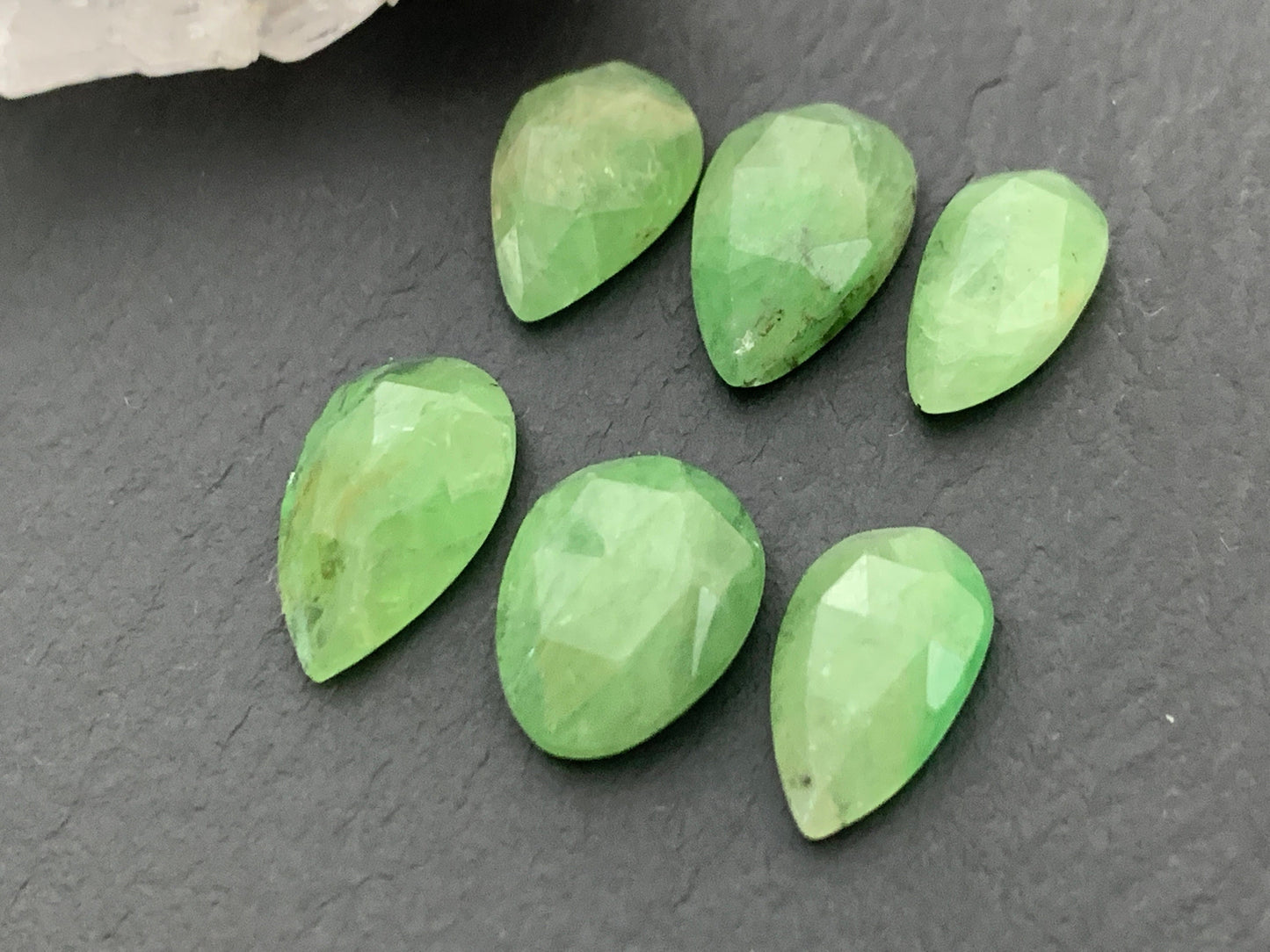 Faceted Tsavorite pear 12-14mm long cabochon