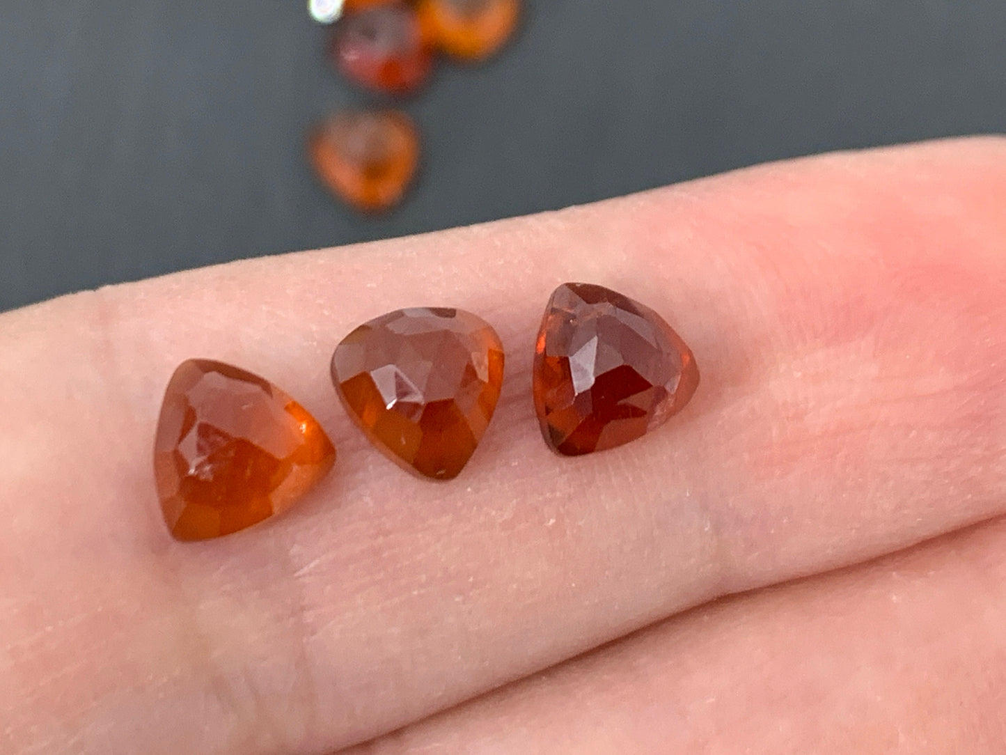 Faceted Hessonite Garnet trillion 6mm cabochon