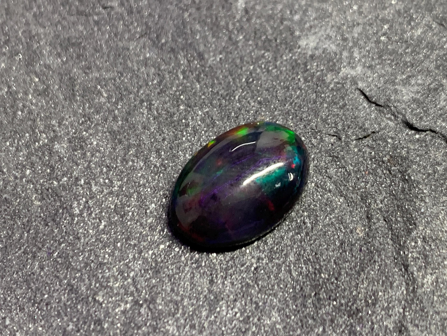 Black Ethiopian Opal oval 9x13x3.5mm cabochon