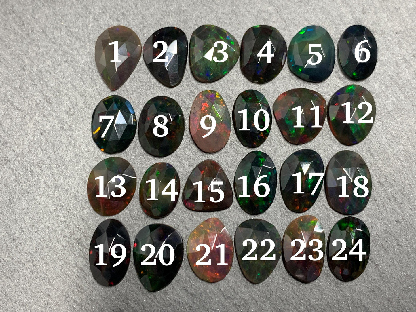 Faceted Black Ethiopian Opal 10-13mm long cabochon