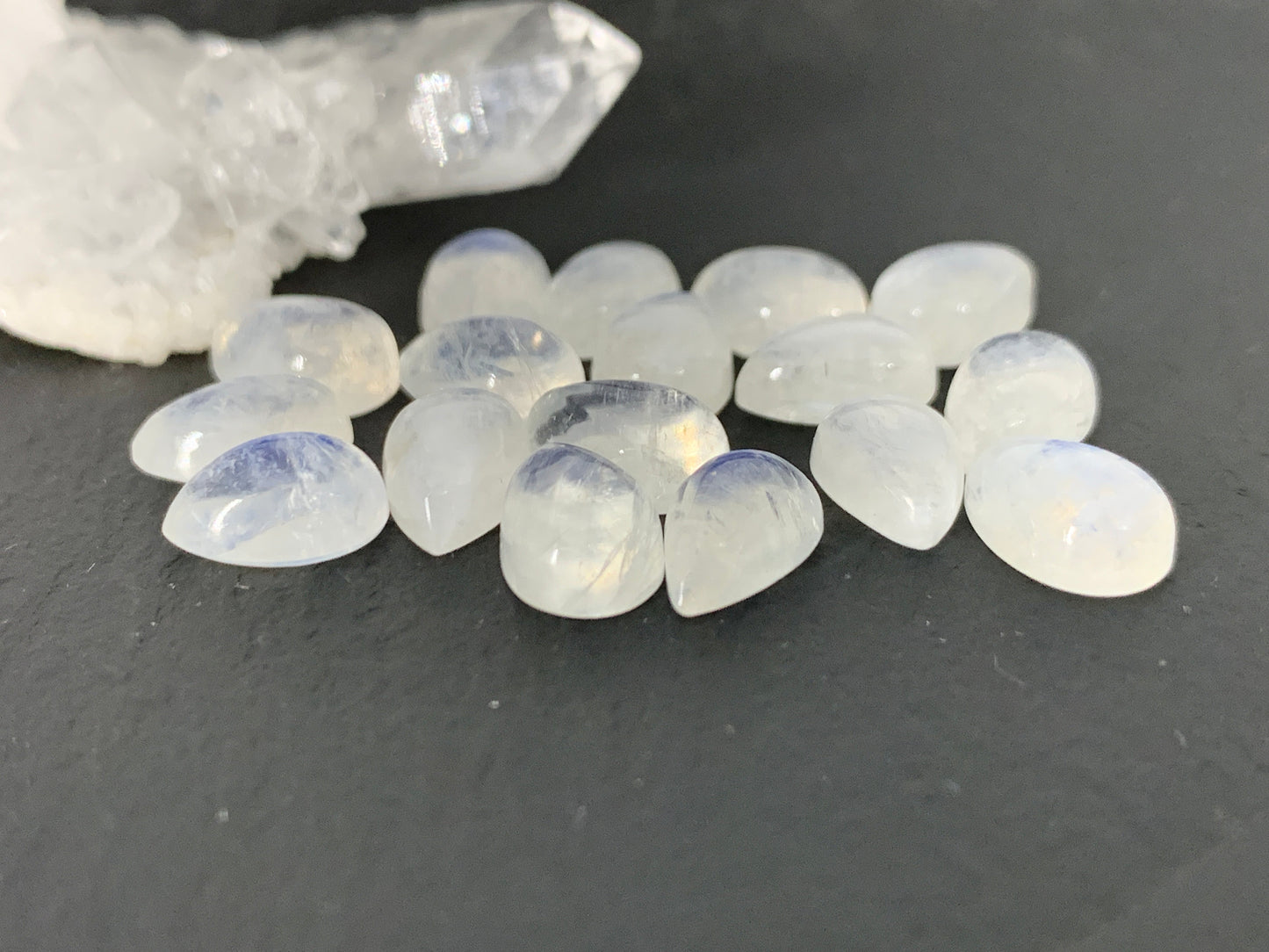 Rainbow Moonstone pear 6x9mm cabochon