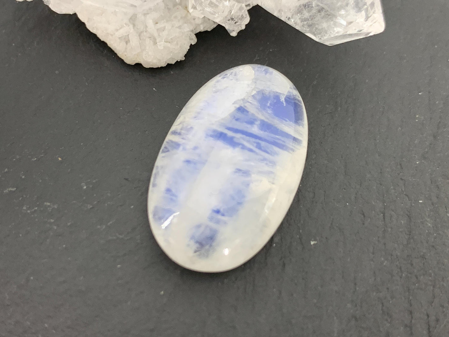Rainbow Moonstone 24x15x7mm cabochon