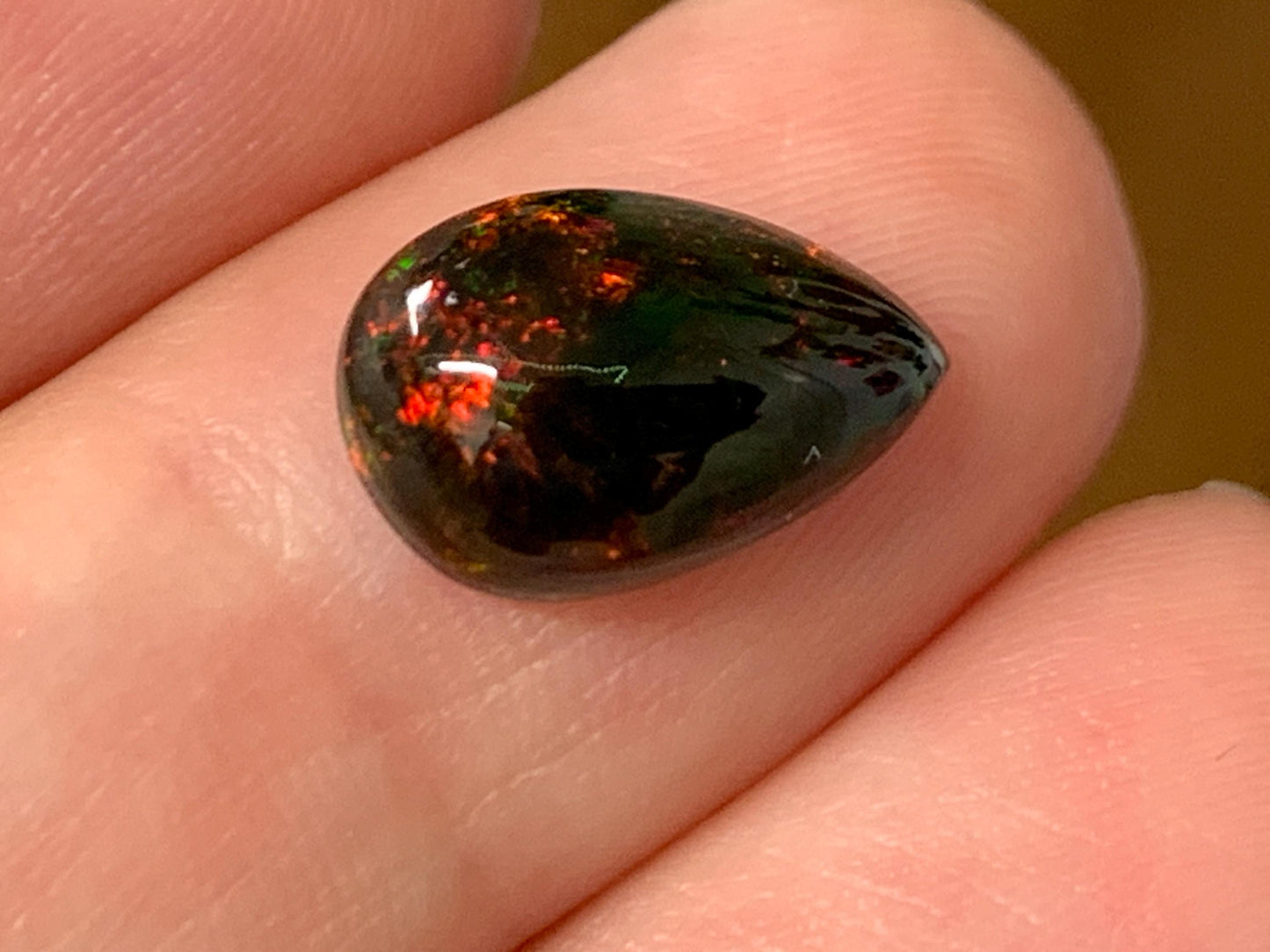 Natural Ethiopian Black Opal 8x12x4mm cabochon