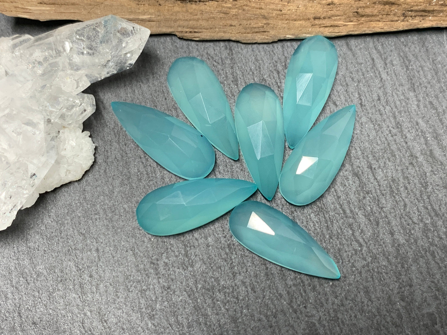 Faceted Aqua Chalcedony pear 8x21mm cabochon