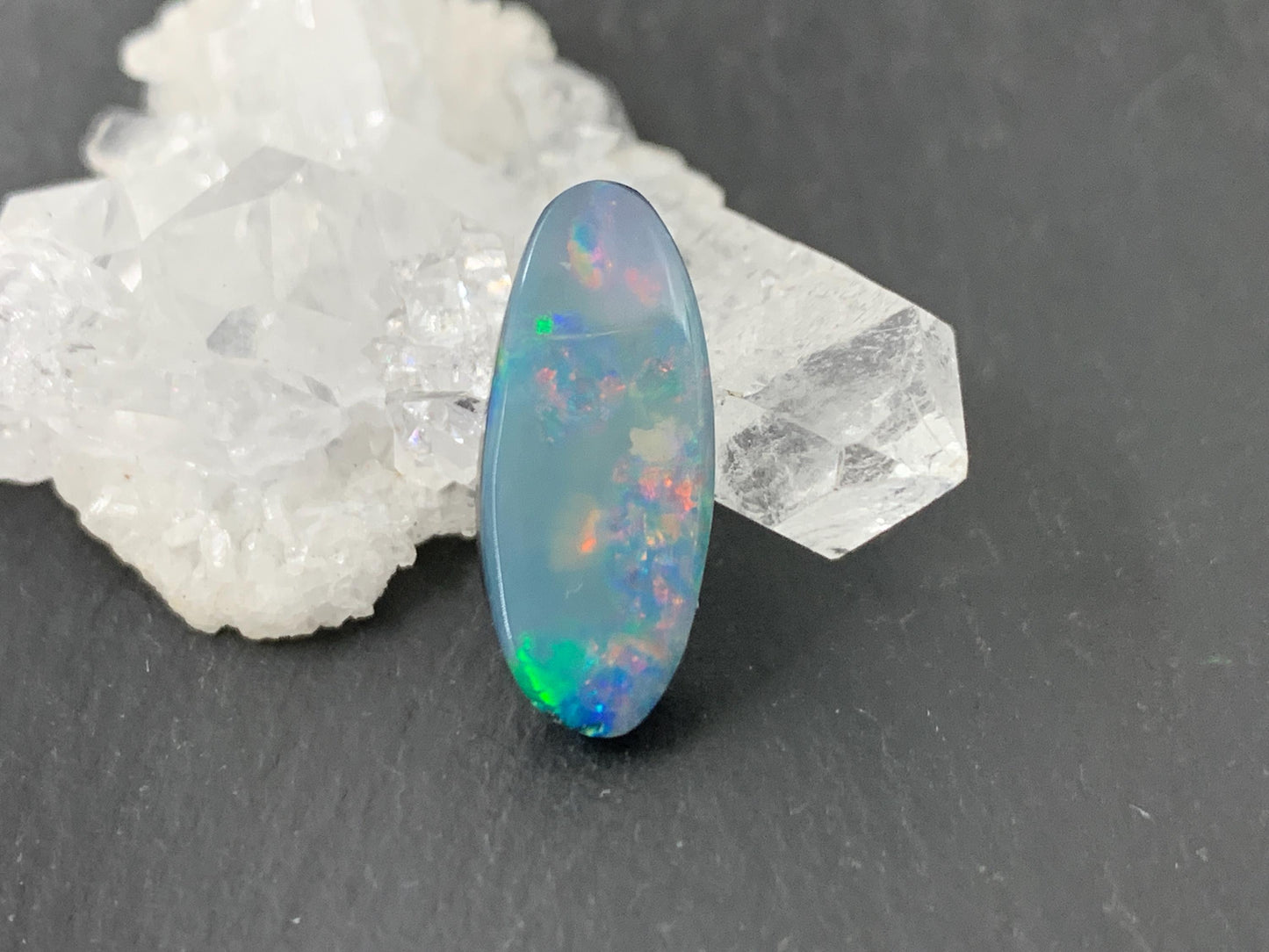 Australian Opal doublet 8x18x4mm cabochon - oval