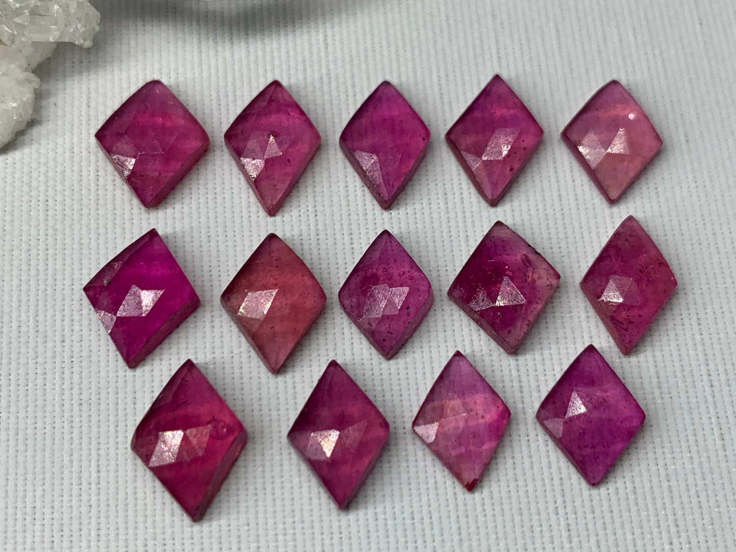 Faceted 10-11mm Thailand Pink Sapphire cabochon