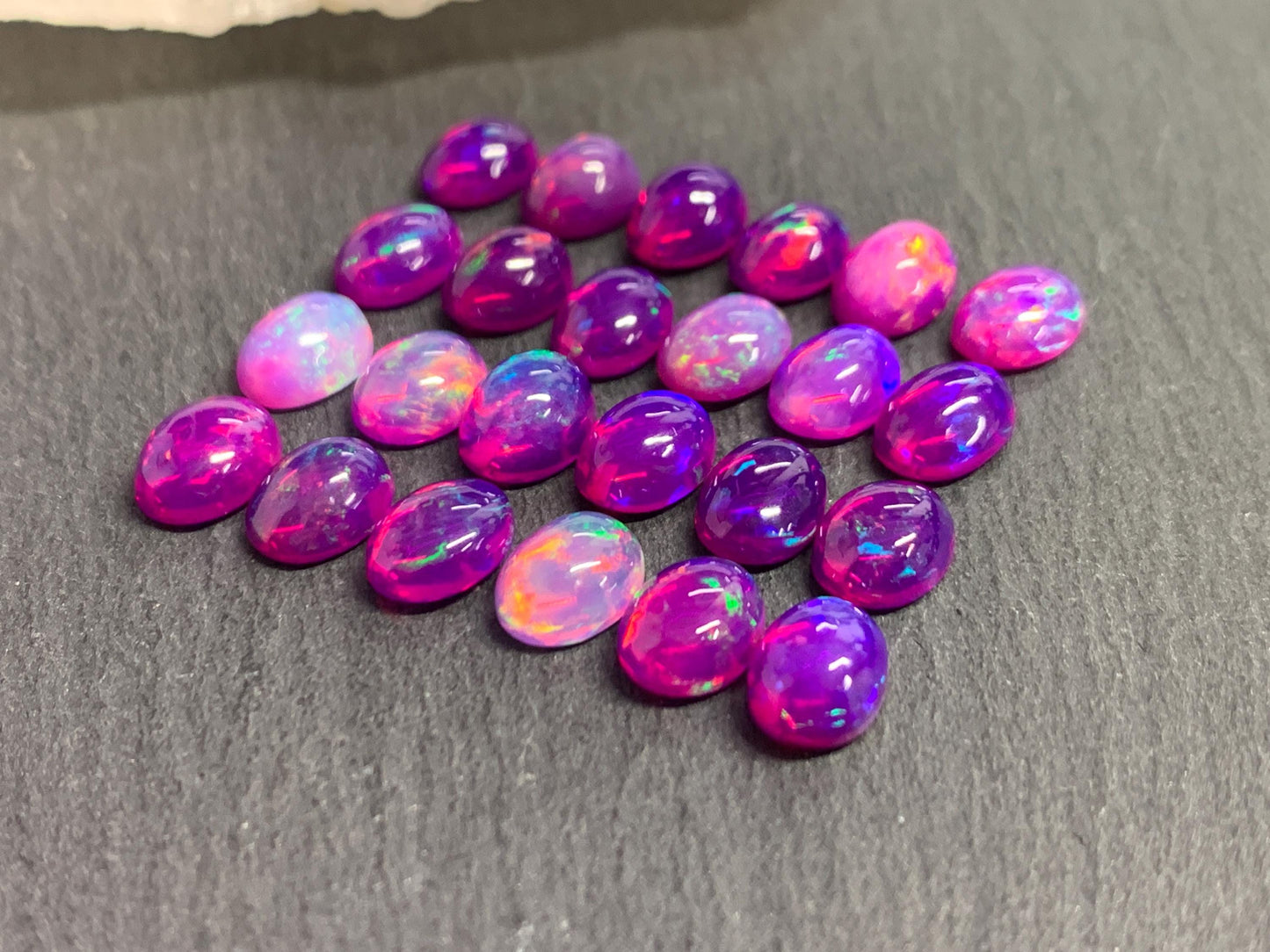 Ethiopian Opal oval 8x10mm cabochon - Natural Opal smoked to purple color