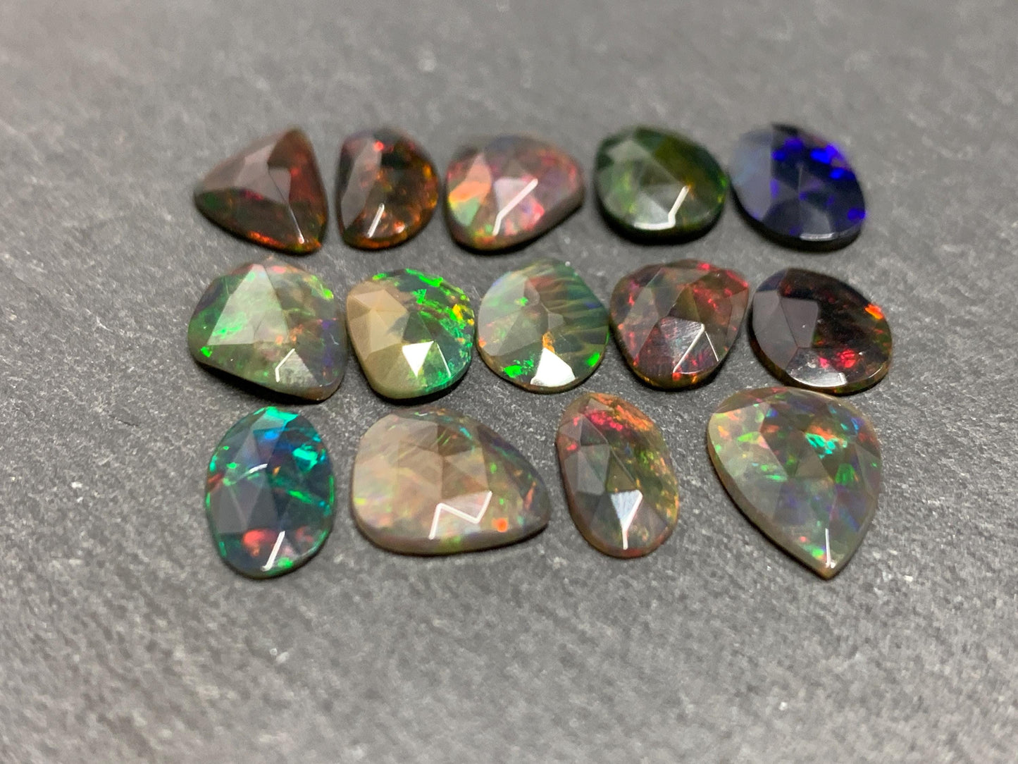 Faceted Black Ethiopian Opal 9-12mm long cabochon