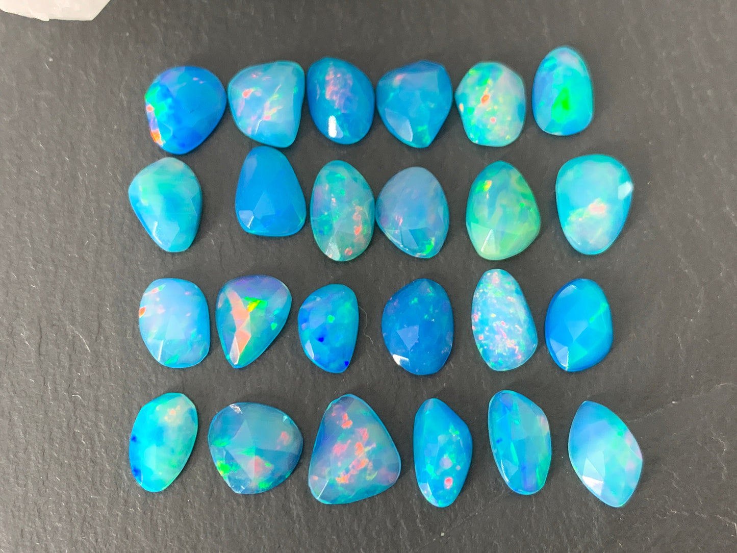 Faceted Blue Ethiopian Opal 9-10mm long cabochon