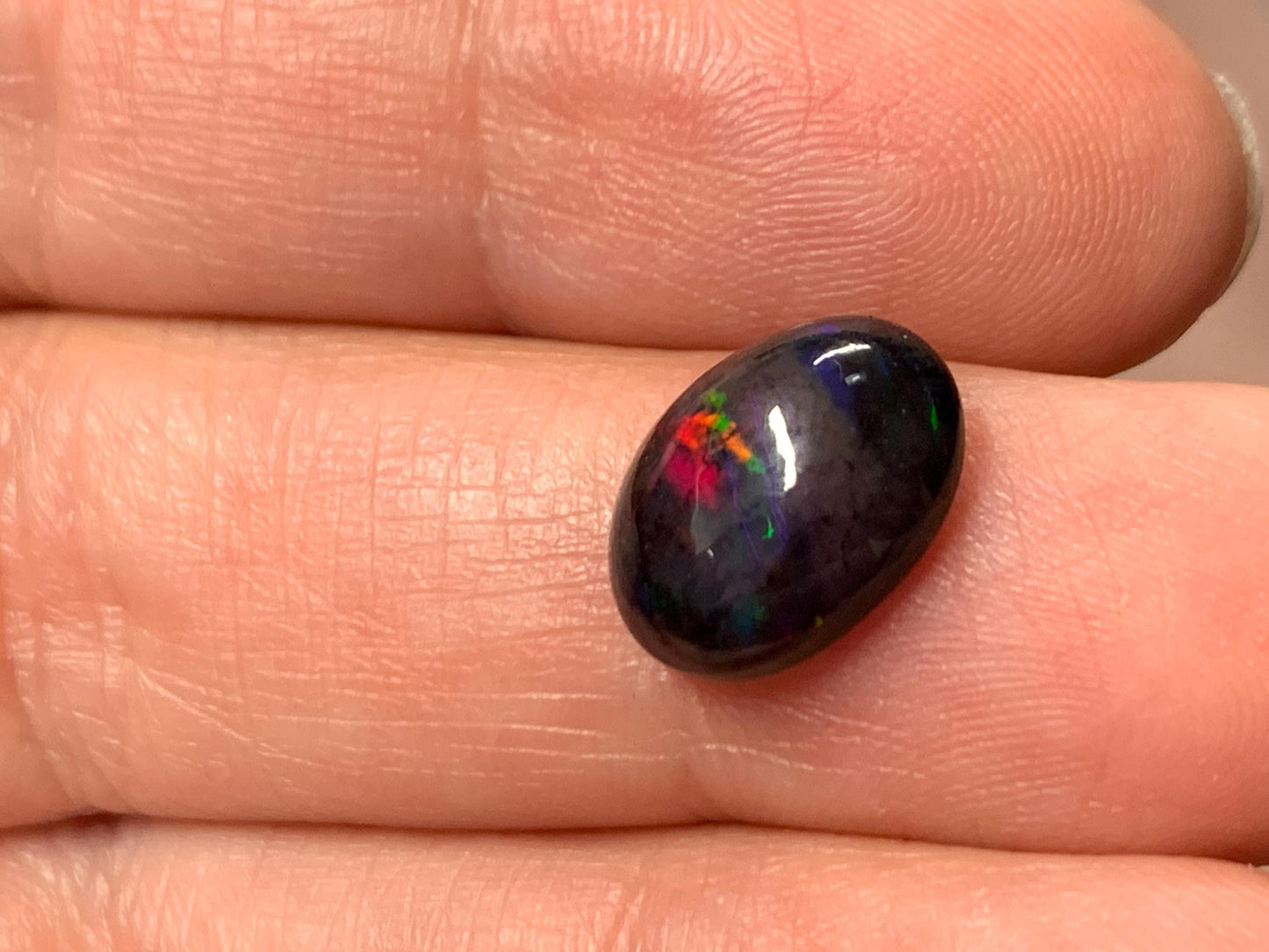 Black Ethiopian Opal oval 9x12x4mm cabochon