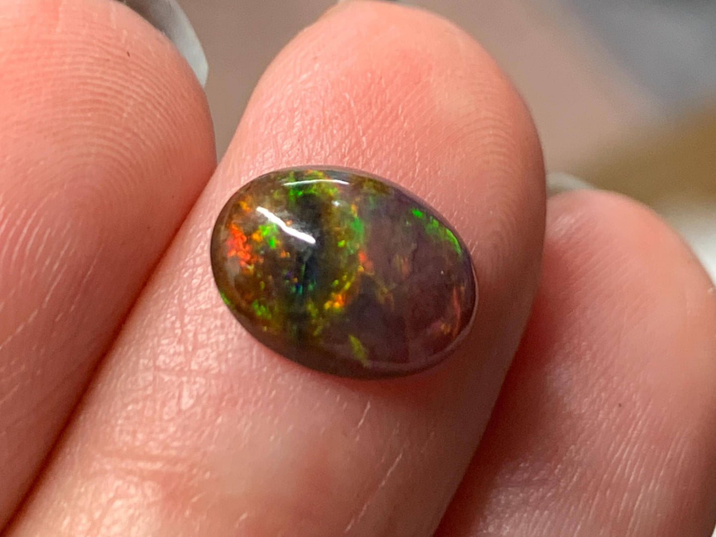 Natural Ethiopian Black Opal 7x10x3mm cabochon