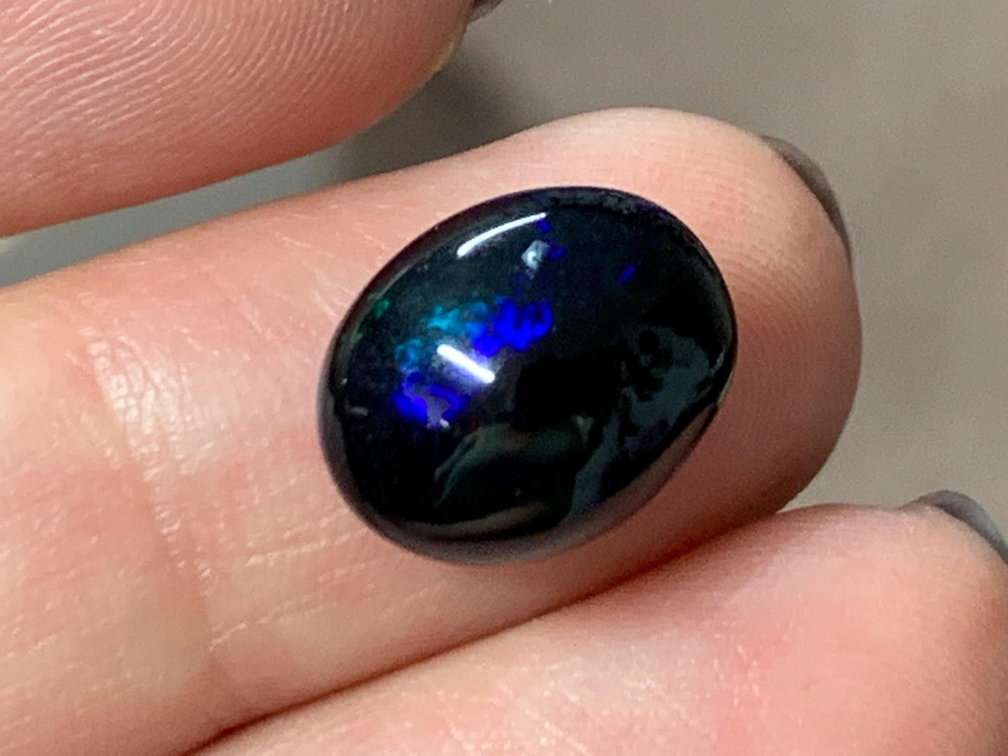 Natural Ethiopian Black Opal 10x12x5mm cabochon