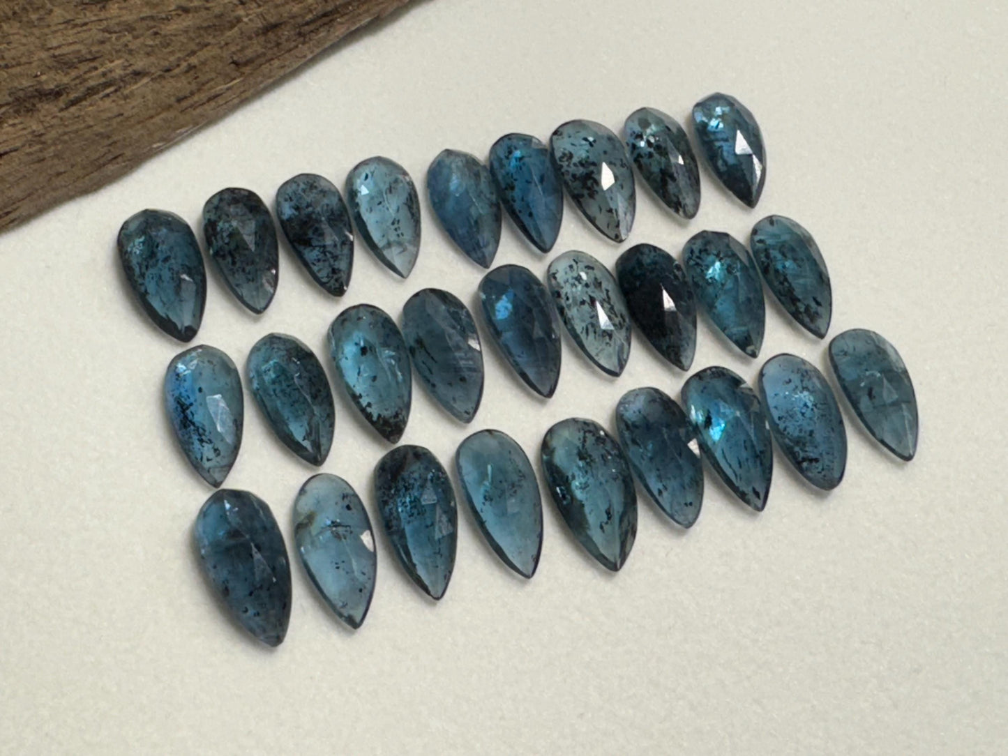 Faceted Moss Kyanite pear 7x15mm cabochon