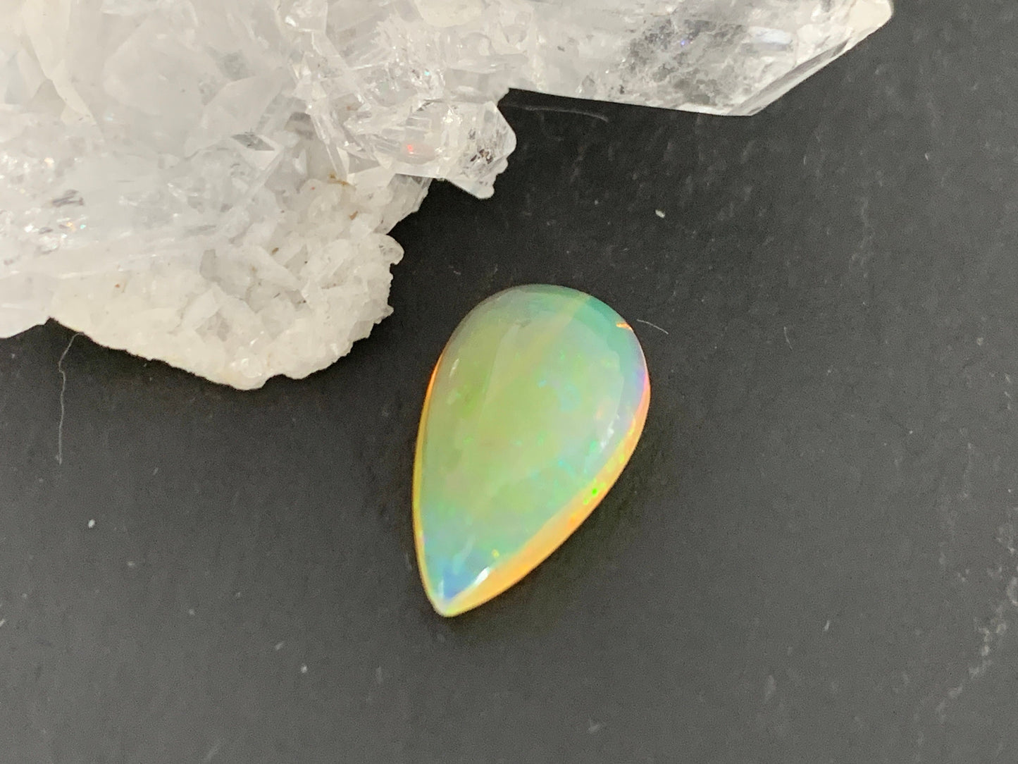 Ethiopian Opal 8x14x4mm cabochon