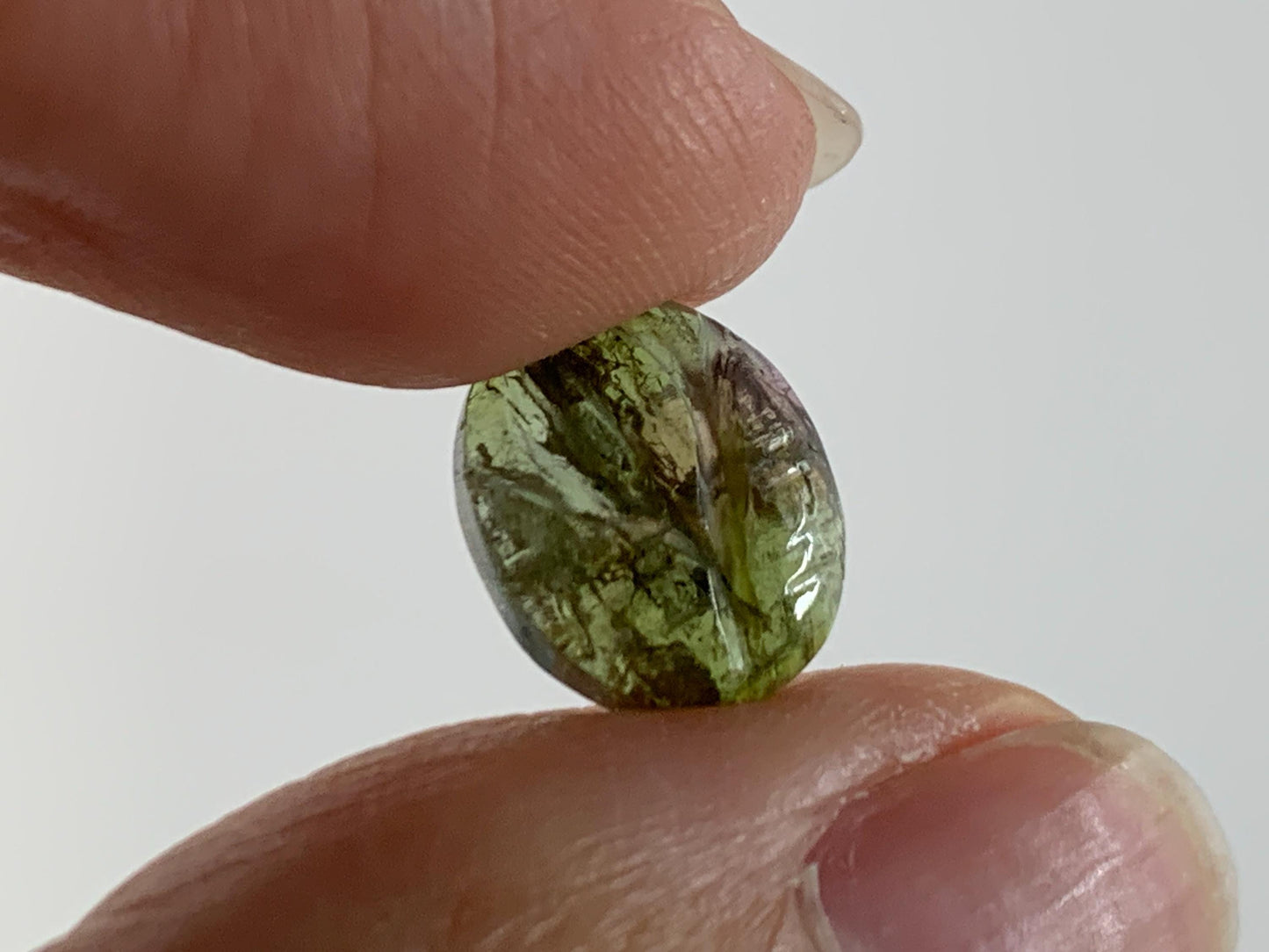 Carved Tourmaline 9x11x4mm cabochon