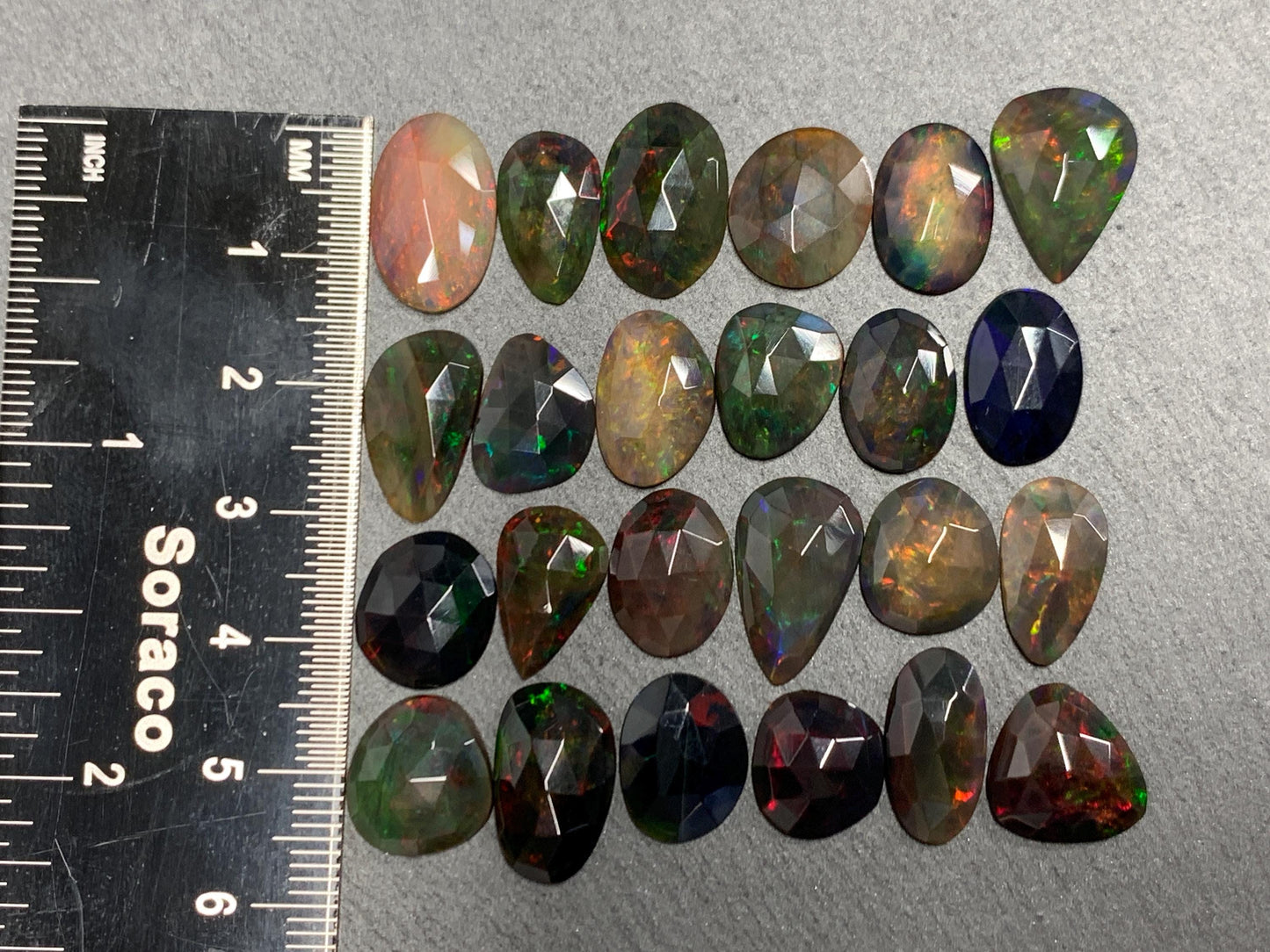 Faceted Black Ethiopian Opal 12-16mm long cabochon