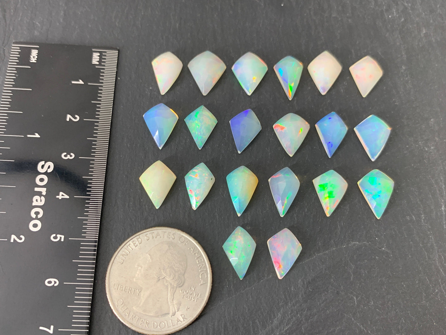 Faceted Ethiopian Opal kite 12-12.5mm long cabochon