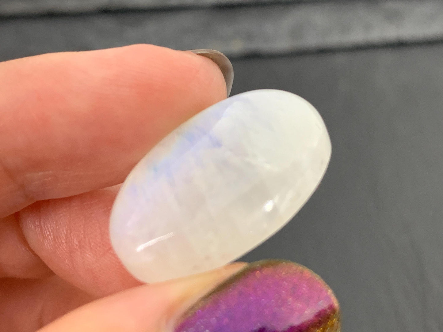 Rainbow Moonstone oval 25x16x8mm cabochon