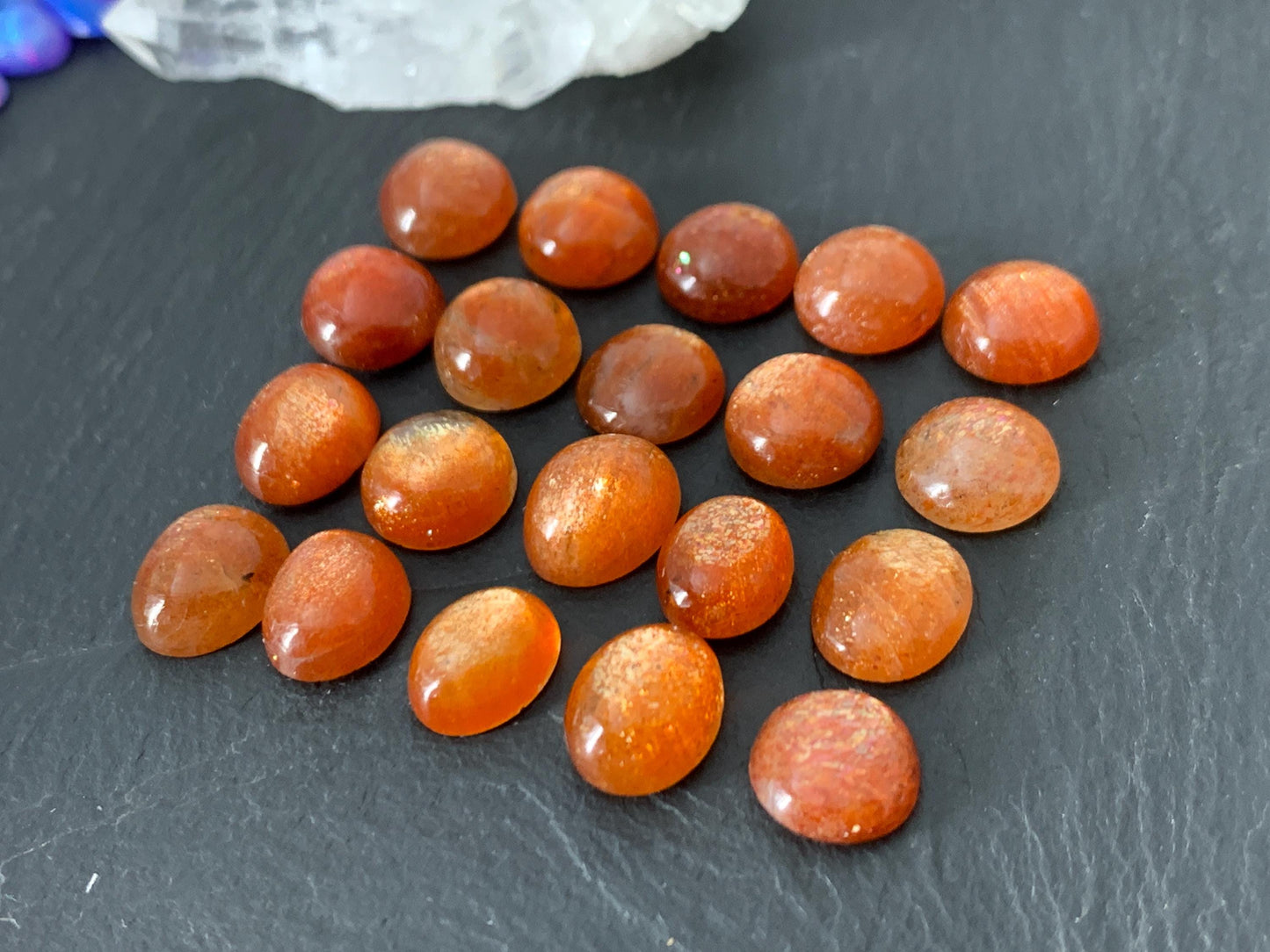 Sunstone round, oval 9-10mm long cabochon