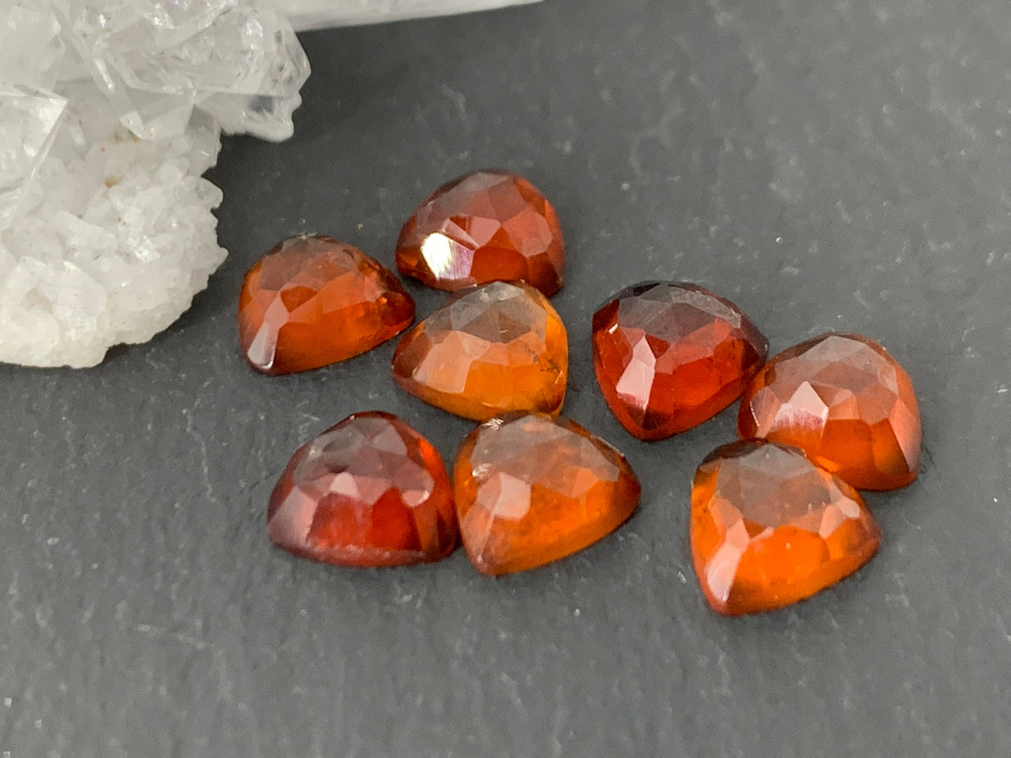 Faceted Hessonite Garnet trillion 6mm cabochon