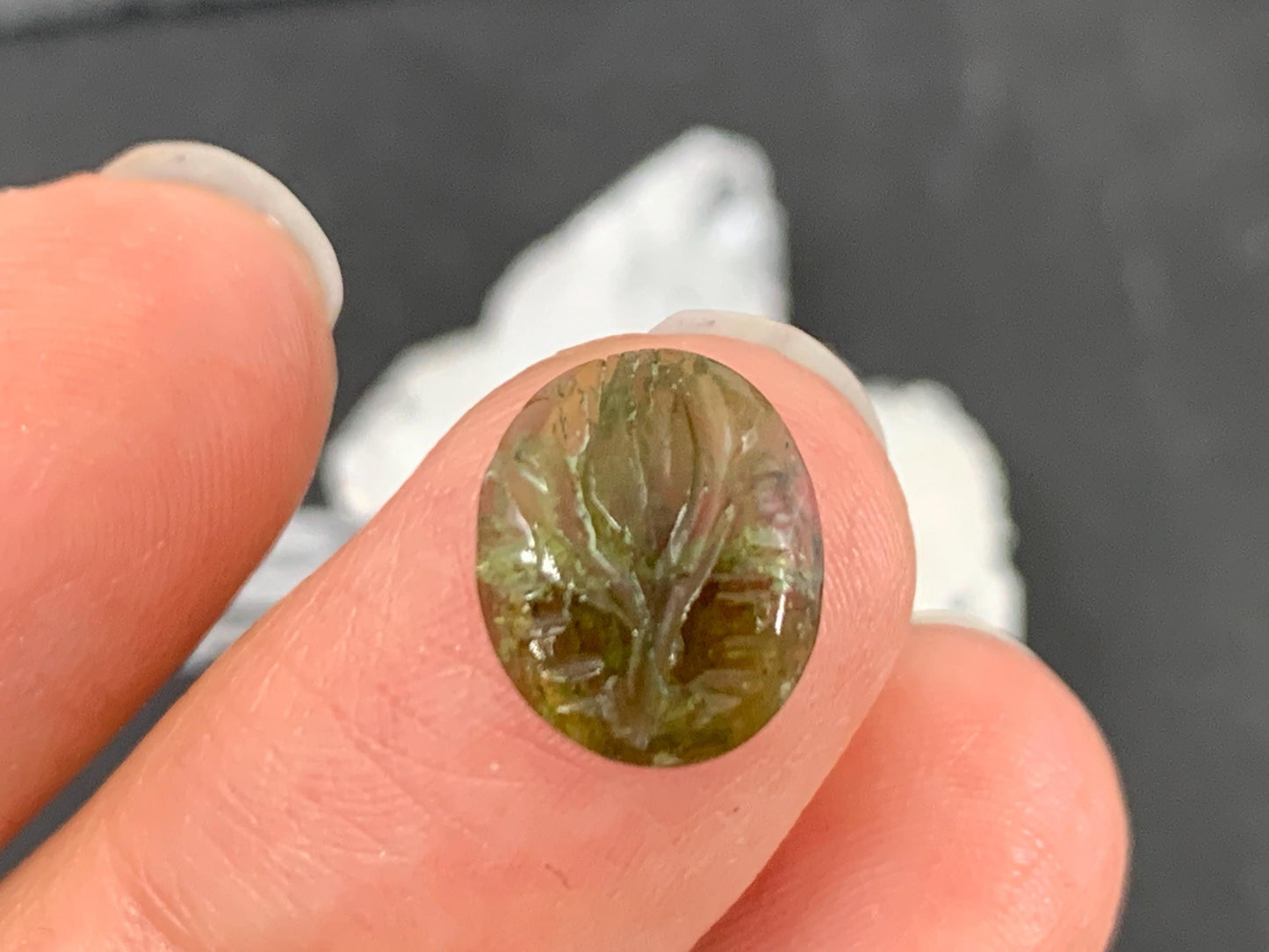 Carved Tourmaline 9x11x4mm cabochon