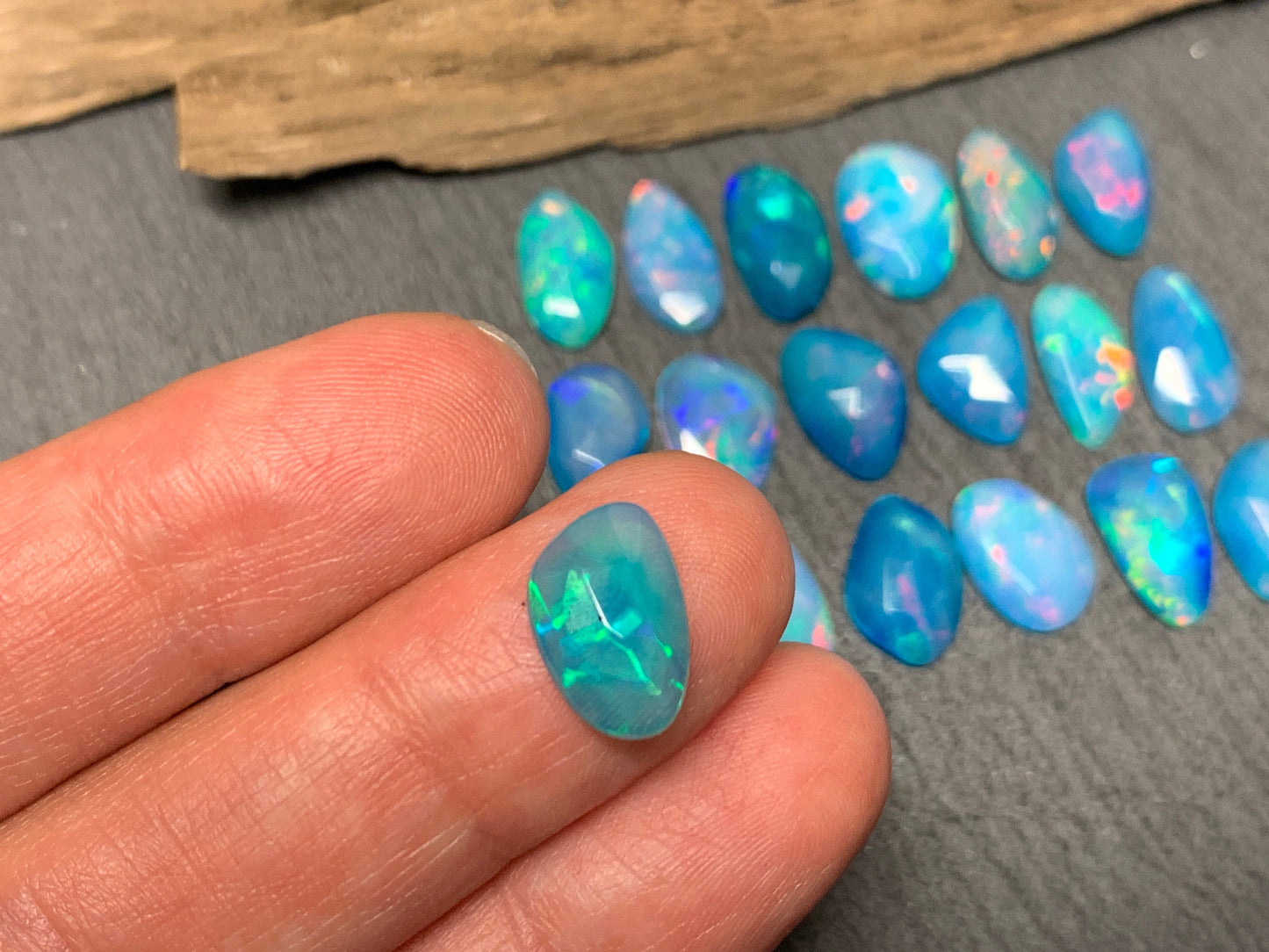 Faceted Blue Ethiopian Opal 11-12mm long cabochon