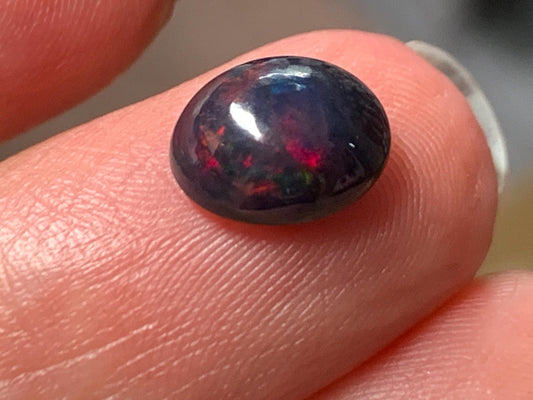 Natural Ethiopian Black Opal 7x9x4mm cabochon