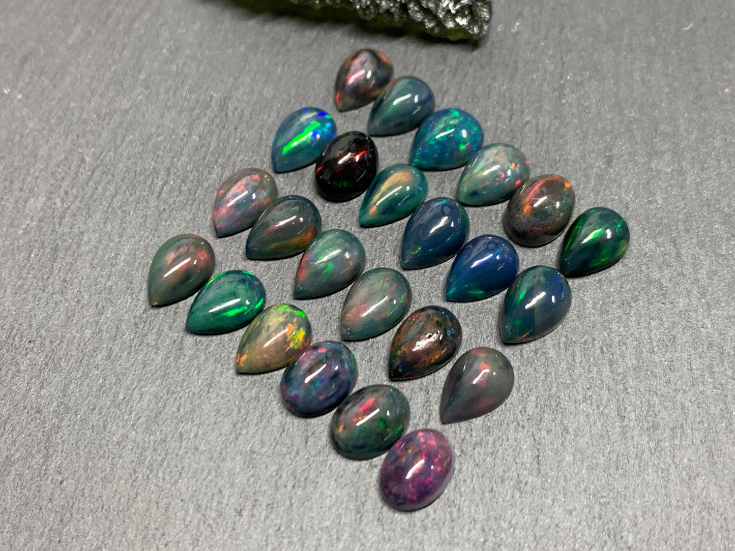 Black Ethiopian Opal pear 8-9mm long cabochon