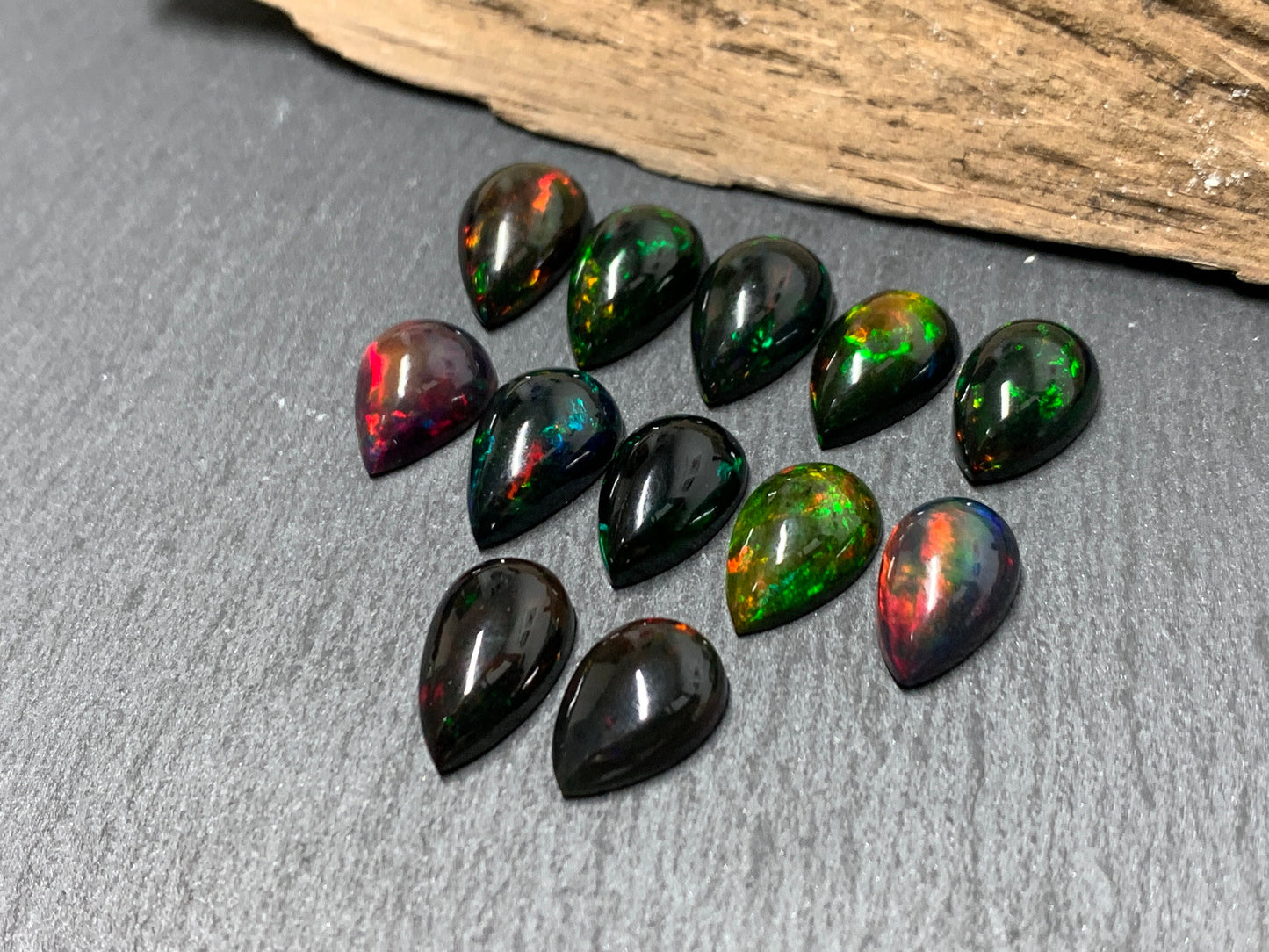 Black Ethiopian Opal pear 12-13mm long cabochon