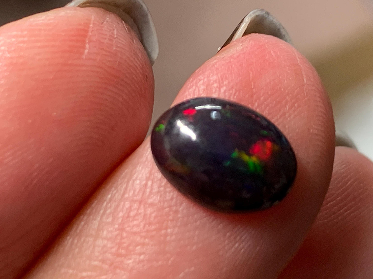 Natural Ethiopian Black Opal 7x9x3mm cabochon