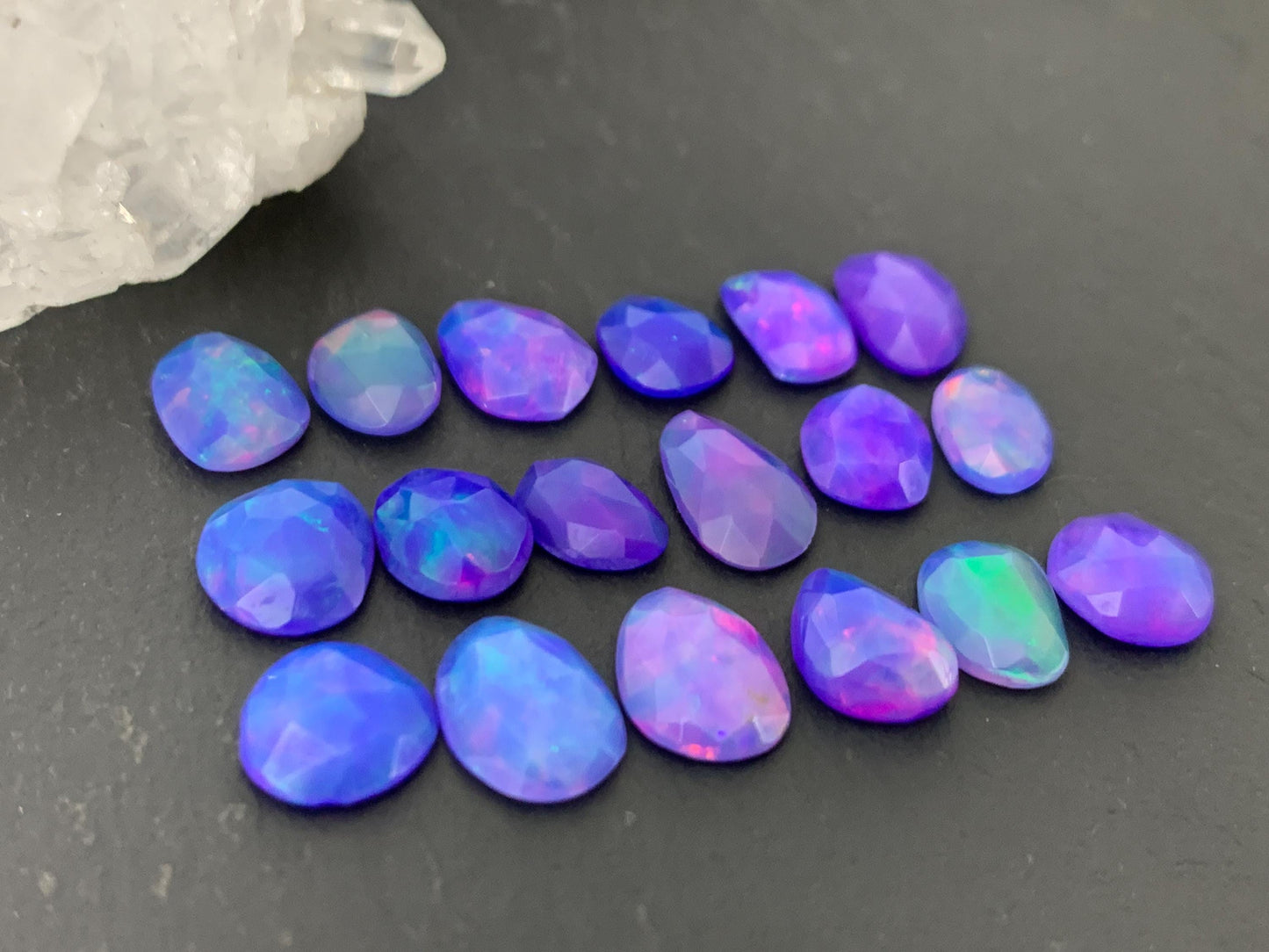 Faceted Purple Ethiopian Opal 7-8mm cabochon