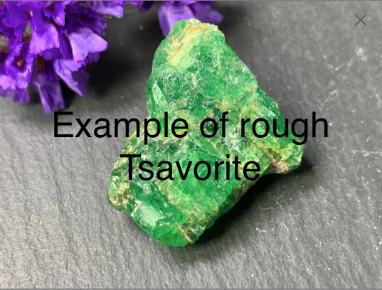 Faceted Tsavorite pear 12-14mm long cabochon