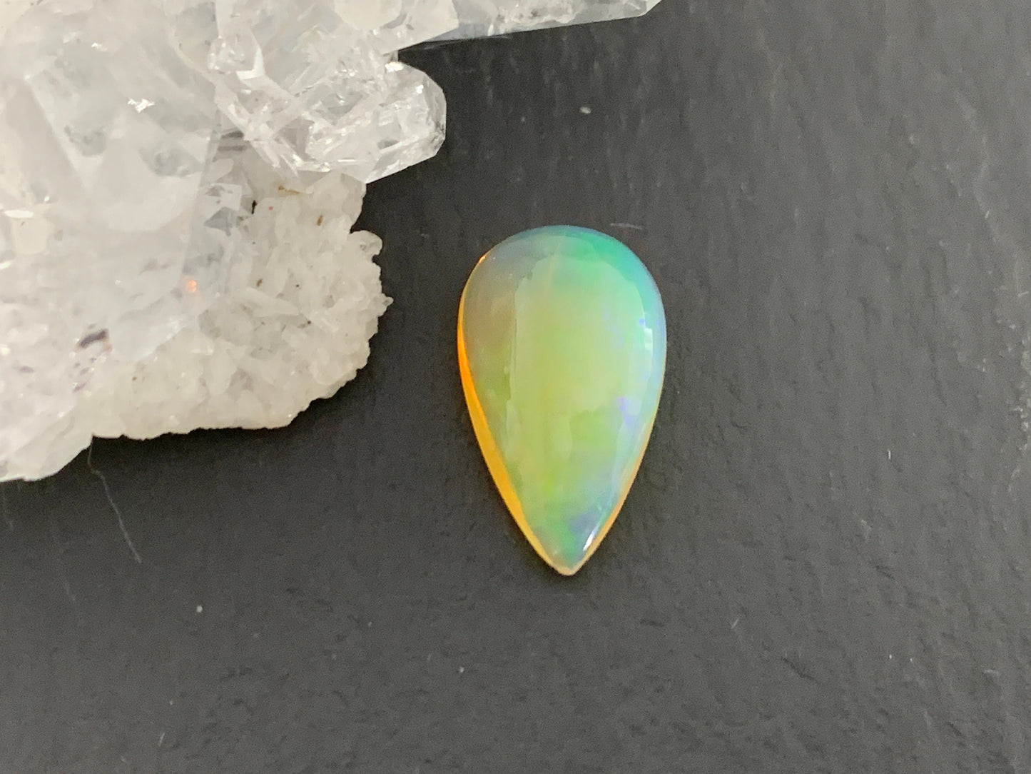 Ethiopian Opal 8x14x4mm cabochon