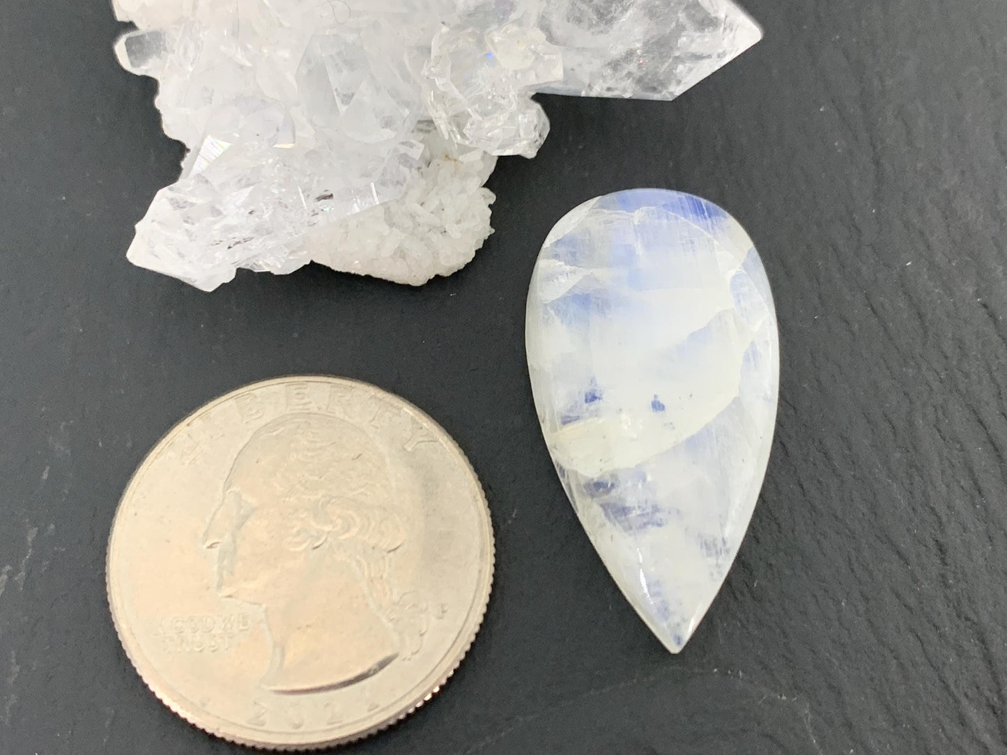 Rainbow Moonstone 30x16x8mm cabochon