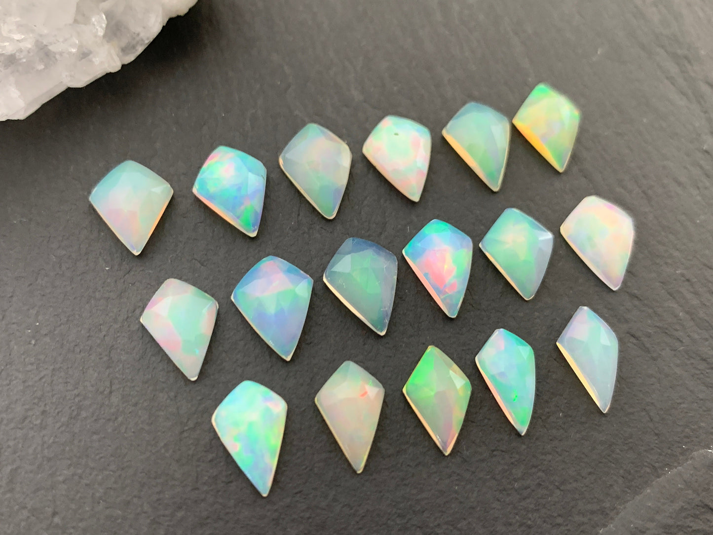 Faceted Welo Opal kite 10-10.5mm cabochon